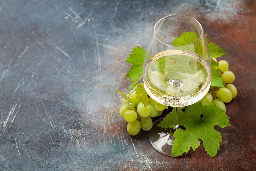 white wine glass grape tastings
